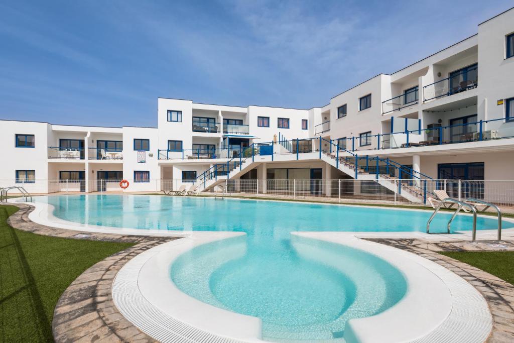 Bazén v ubytování Home2Book Aloha Palm nebo v jeho okolí