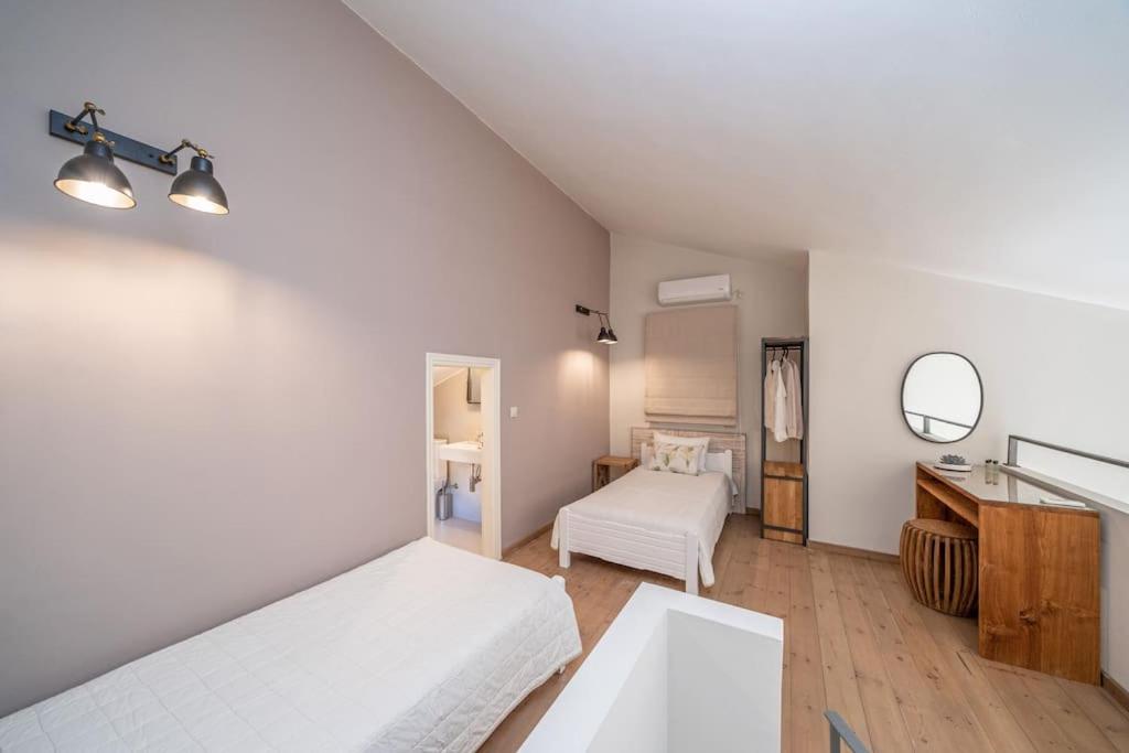 Postel nebo postele na pokoji v ubytování Seashell Luxury Residence - Apartment 2