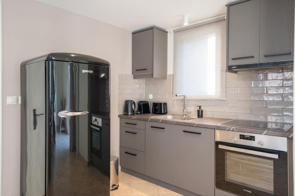 Kuchyň nebo kuchyňský kout v ubytování Seashell Luxury Residence - Apartment 2