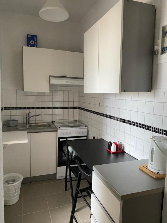 Kuchyňa alebo kuchynka v ubytovaní Apartment M & M