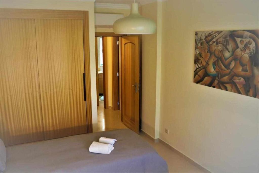 Postel nebo postele na pokoji v ubytování AlgarveSand Porches