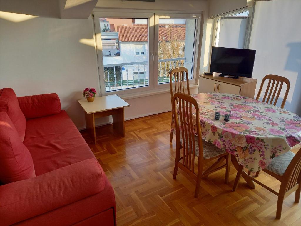 TV a/nebo společenská místnost v ubytování Villa Fontana