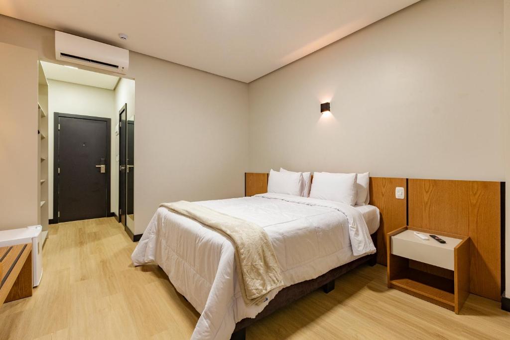 Postel nebo postele na pokoji v ubytování Tri Hotel Antônio Prado
