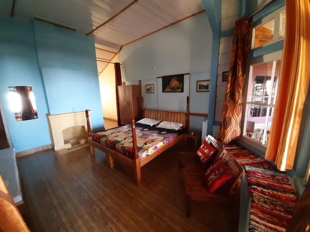 Postel nebo postele na pokoji v ubytování Leela Cottages