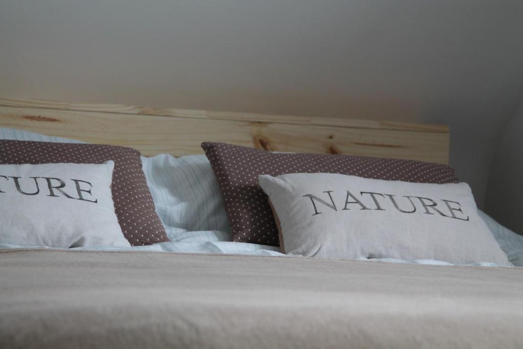 Postel nebo postele na pokoji v ubytování Maison Mama Neko