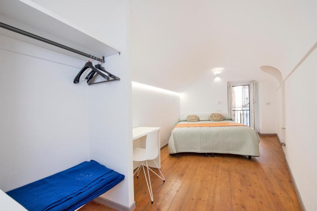 A bed or beds in a room at Piccolo Scrigno