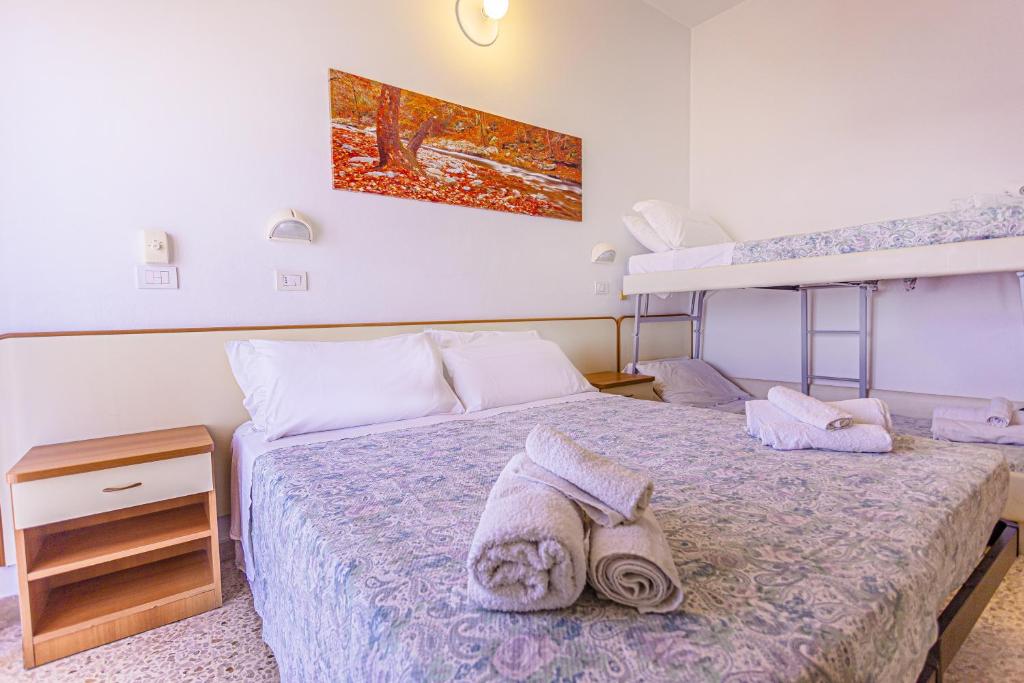 Postel nebo postele na pokoji v ubytování Hotel Continental