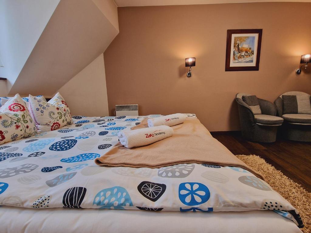 Posteľ alebo postele v izbe v ubytovaní ZAKOapartamenty BUTOROWY RESIDENCE