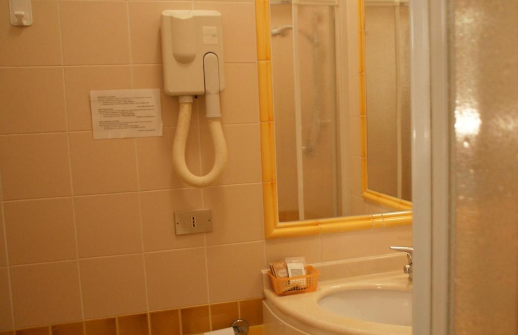 Koupelna v ubytování Hotel Verudella