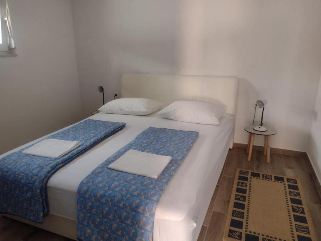 Posteľ alebo postele v izbe v ubytovaní Apartments Franica
