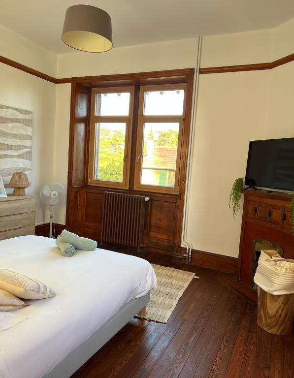 Posteľ alebo postele v izbe v ubytovaní O'Cottage suite Familiale