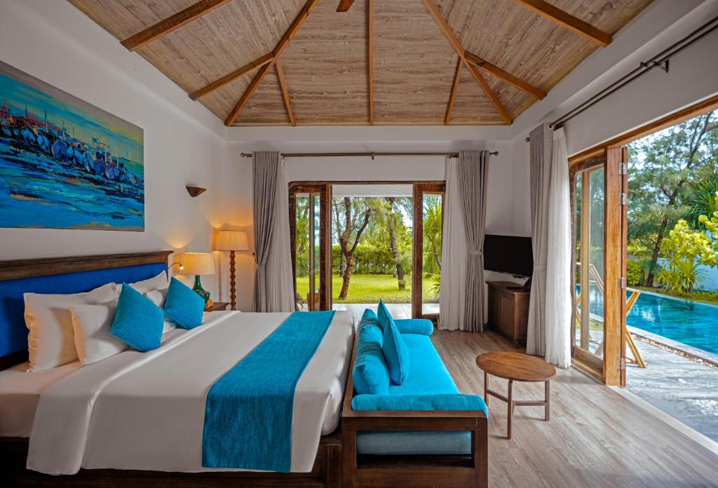 Postel nebo postele na pokoji v ubytování Stelia Beach Resort