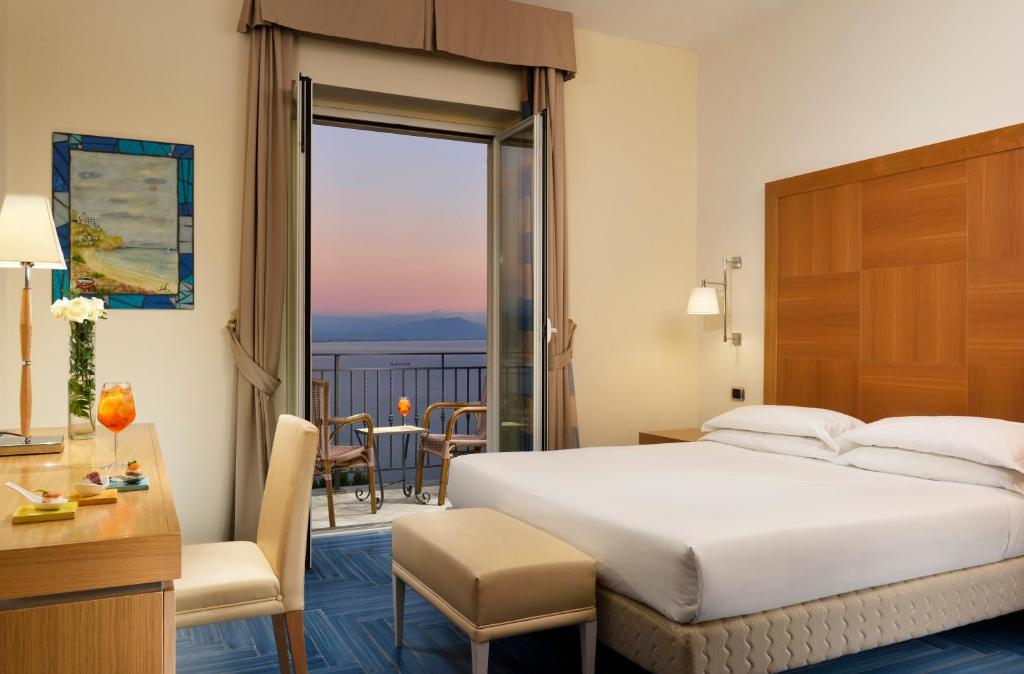 Posteľ alebo postele v izbe v ubytovaní Hotel Raito Wellness & SPA