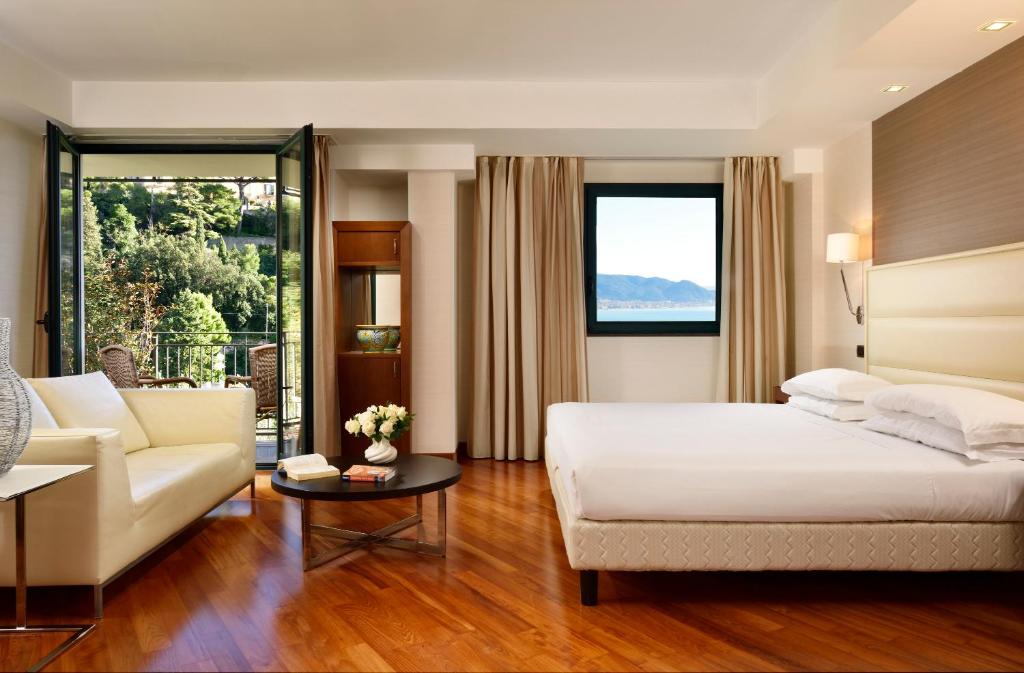 Posteľ alebo postele v izbe v ubytovaní Hotel Raito Wellness & SPA
