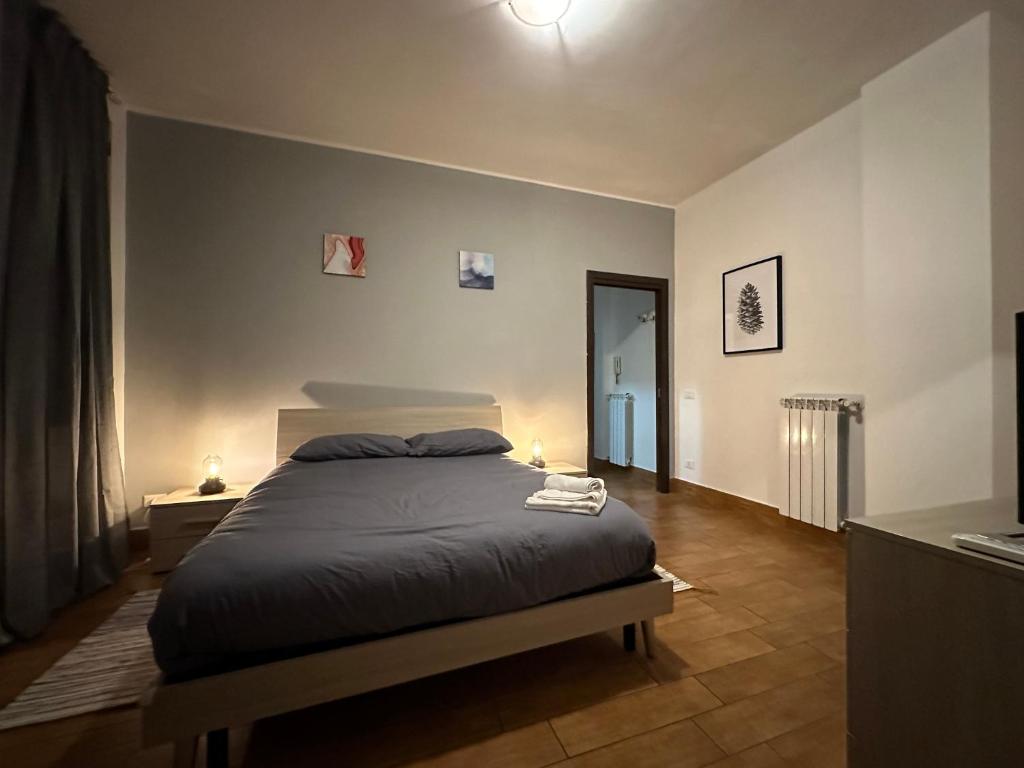 Ліжко або ліжка в номері Vatican Flat Cozy with Terrace