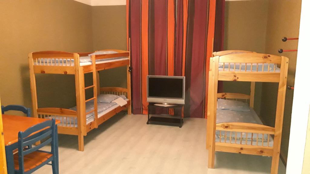 Postel nebo postele na pokoji v ubytování TORE KÜLALISTEMAJA