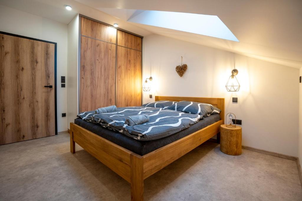 Postel nebo postele na pokoji v ubytování Lázeňské Apartmány