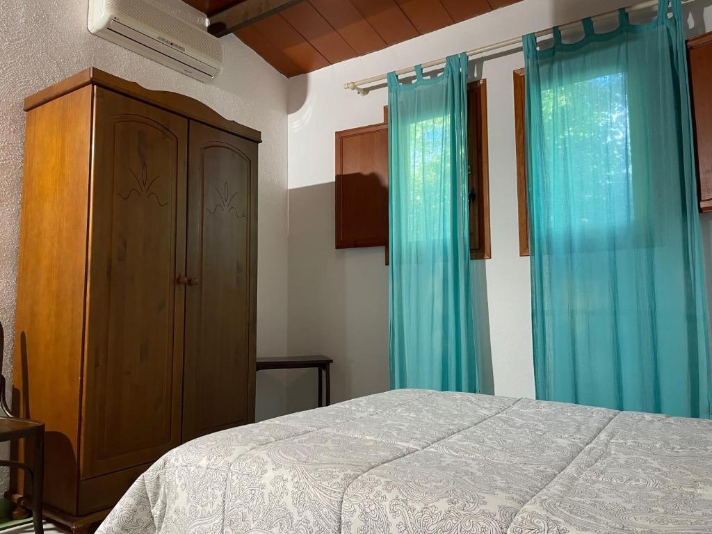 Posteľ alebo postele v izbe v ubytovaní Allotjament rural Illa de Mar