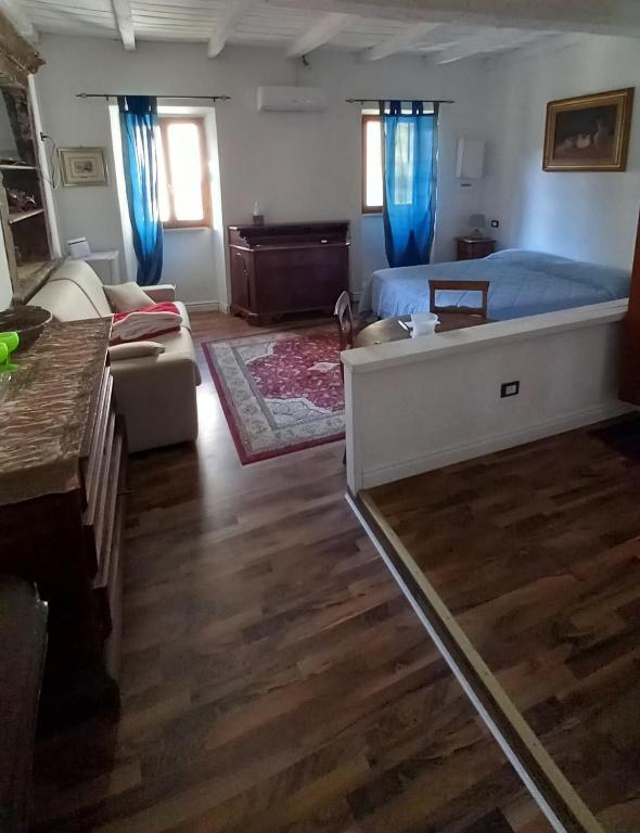 A bed or beds in a room at Casetta papacqua
