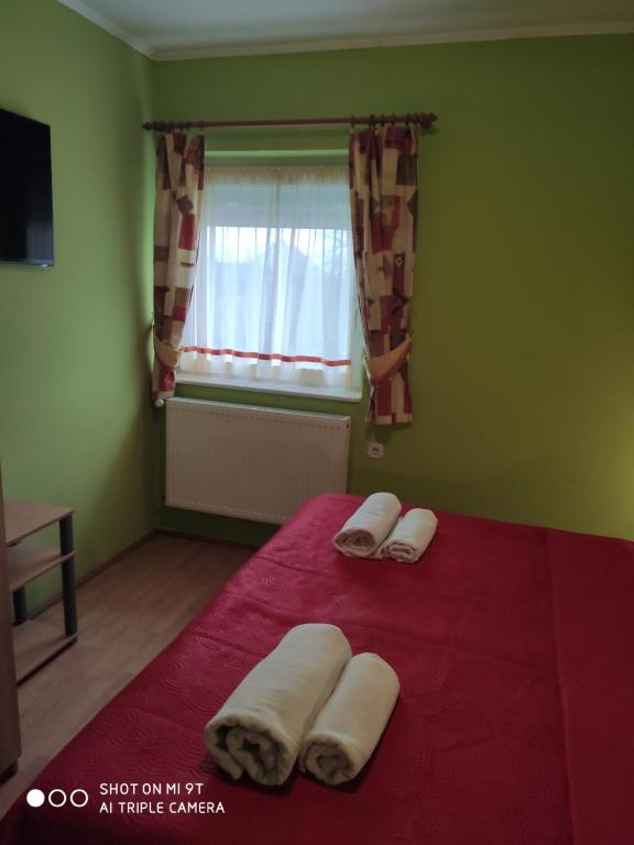 Posteľ alebo postele v izbe v ubytovaní Relax apartman