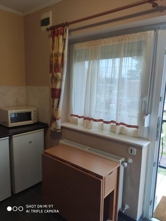 Kuchyňa alebo kuchynka v ubytovaní Relax apartman