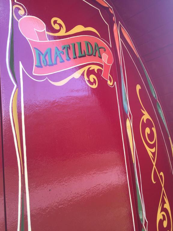 a red refrigerator with a marriott sign on it at Glamping at South Lytchett Manor in Poole