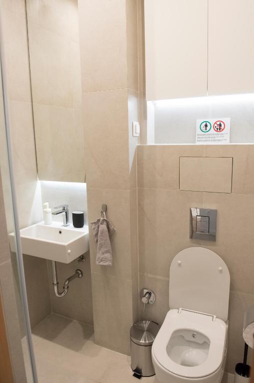 A bathroom at Top Center Designer Studio Apartment