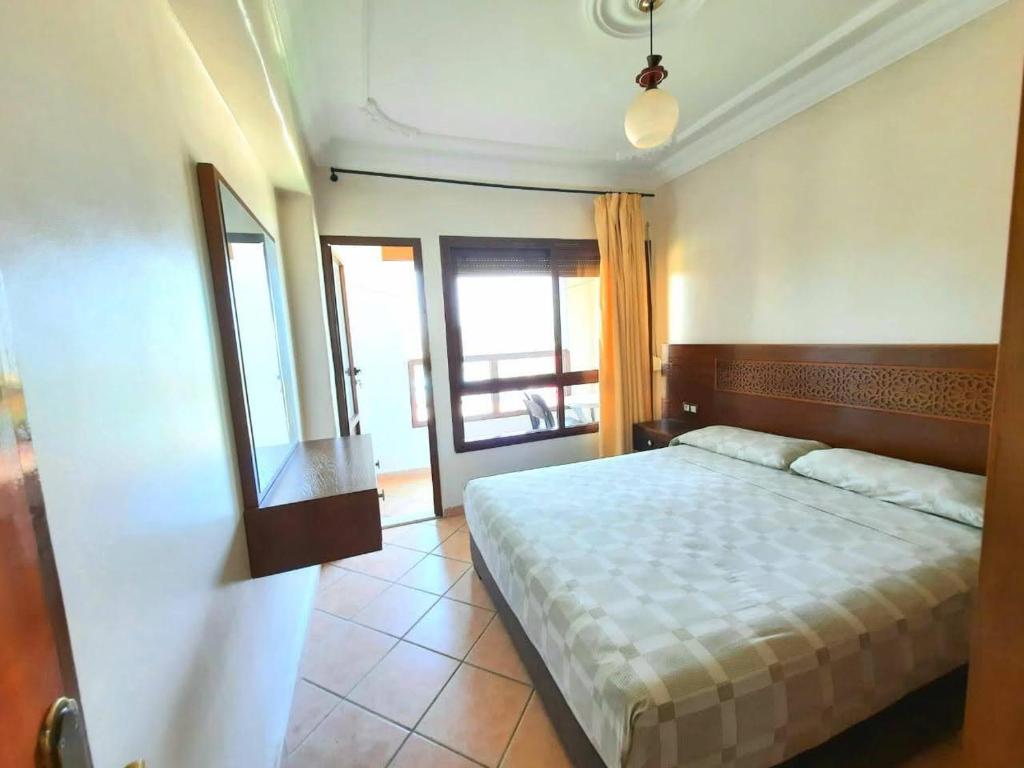 Un pat sau paturi într-o cameră la Residence Las palmas