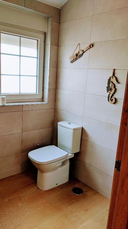 Kúpeľňa v ubytovaní Chalet Galizano Junto a la Playa