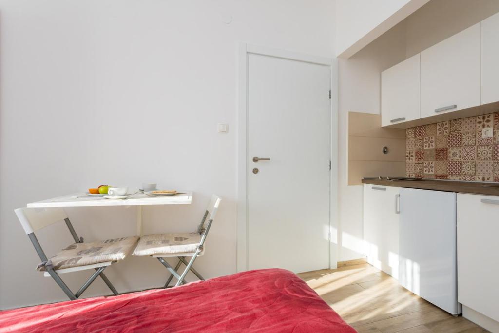 Kuchyň nebo kuchyňský kout v ubytování Apartments and Rooms Kod Keti