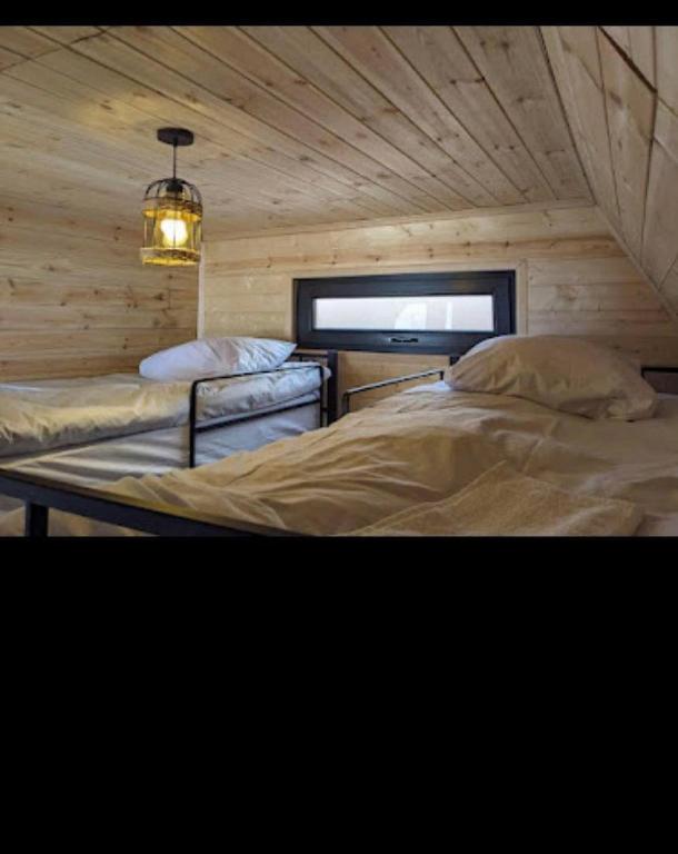 Postel nebo postele na pokoji v ubytování Cottage in Gudauri