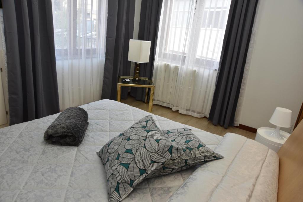 Postel nebo postele na pokoji v ubytování B&B LE DUE ISOLE