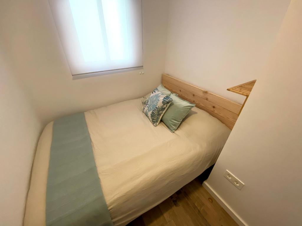 Postel nebo postele na pokoji v ubytování Apartamento La Merced
