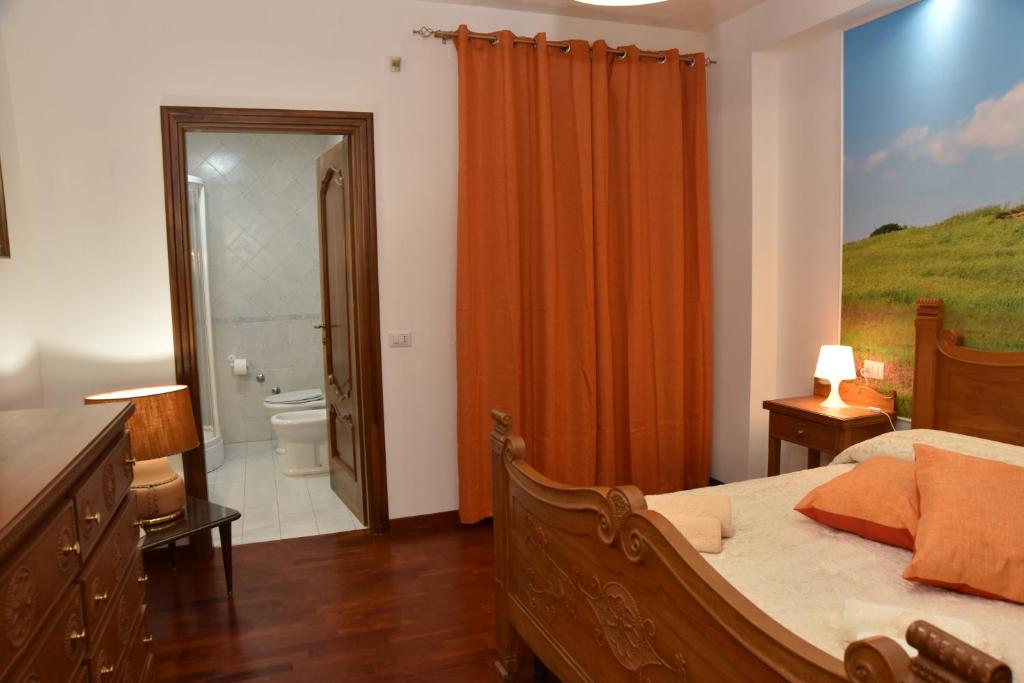 Postel nebo postele na pokoji v ubytování B&B LE DUE ISOLE