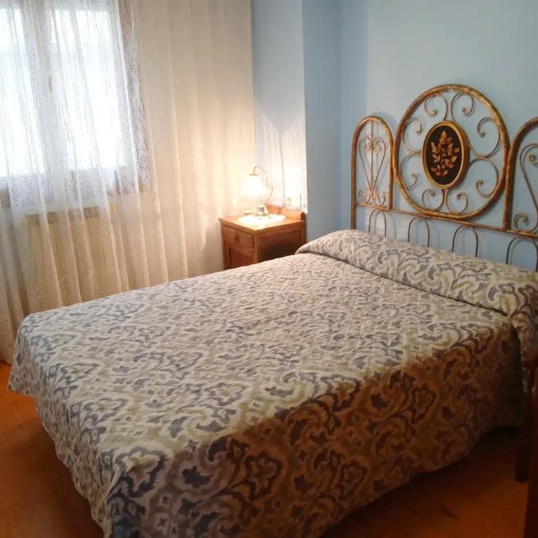 Postel nebo postele na pokoji v ubytování Casa Quini
