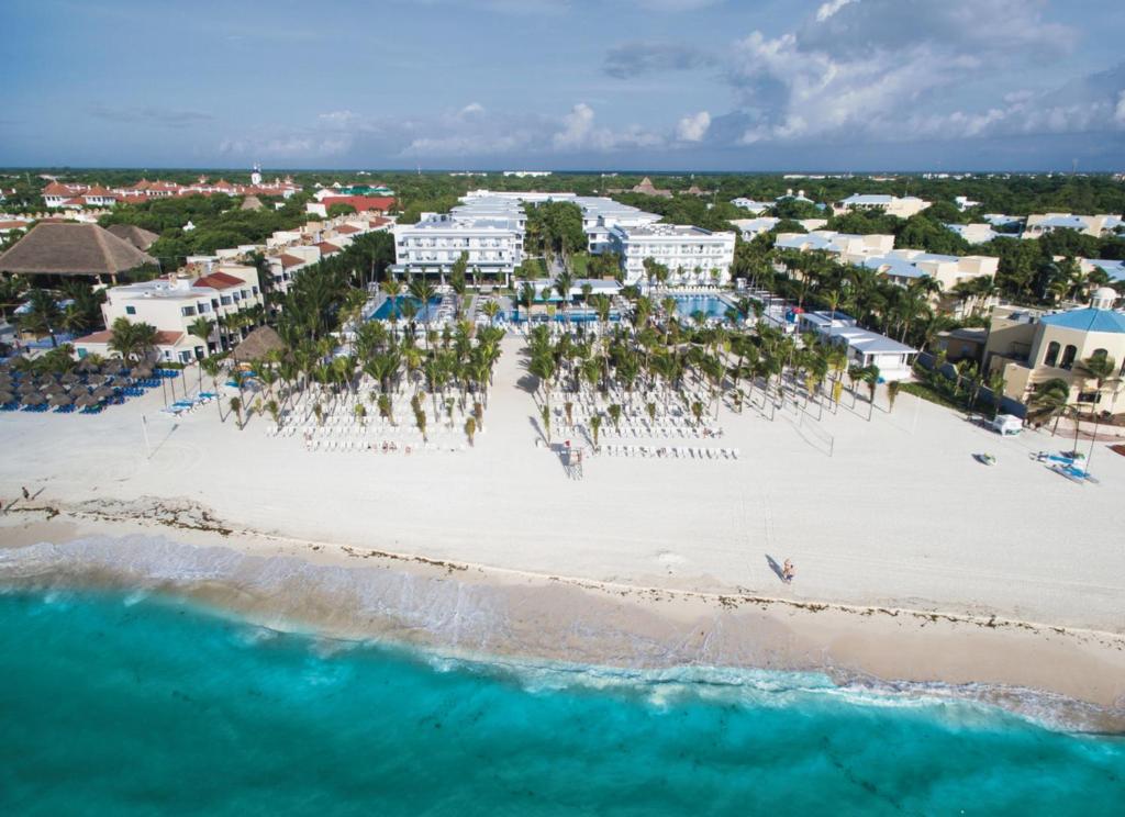 an aerial view of a resort on a beach at Riu Playacar - All Inclusive in Playa del Carmen