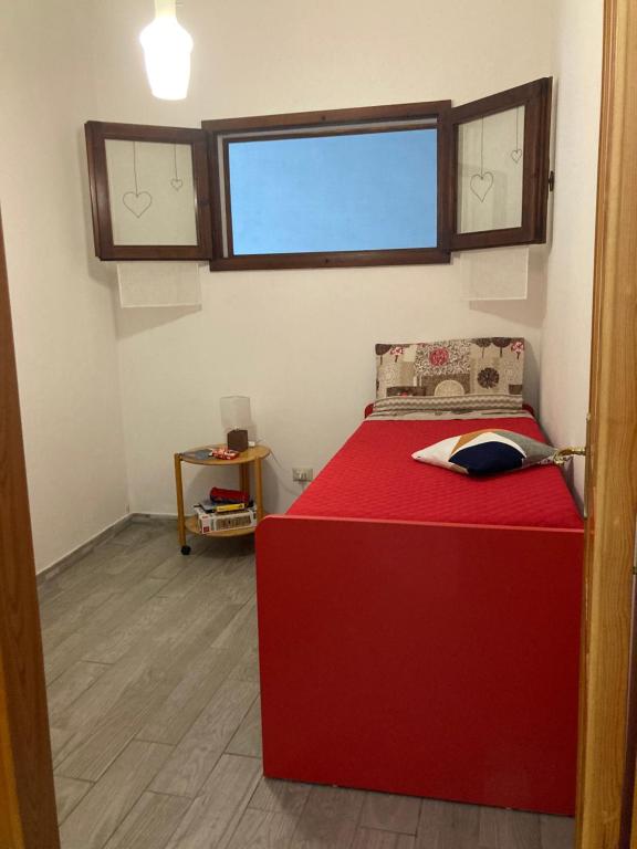 Postel nebo postele na pokoji v ubytování al Sulcis 35