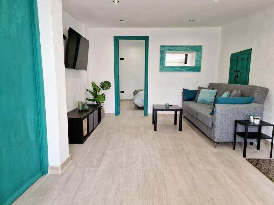 TV a/nebo společenská místnost v ubytování APARTAMENTO CON TERRAZA Y BARBACOA