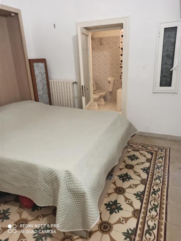 Postel nebo postele na pokoji v ubytování bianco 900