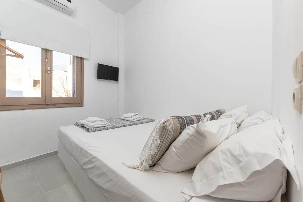 Posteľ alebo postele v izbe v ubytovaní Cozy Comfy Town House