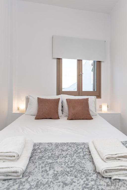 Posteľ alebo postele v izbe v ubytovaní Cozy Comfy Town House
