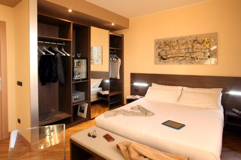 Postel nebo postele na pokoji v ubytování Hotel & Spa Villa Mercede