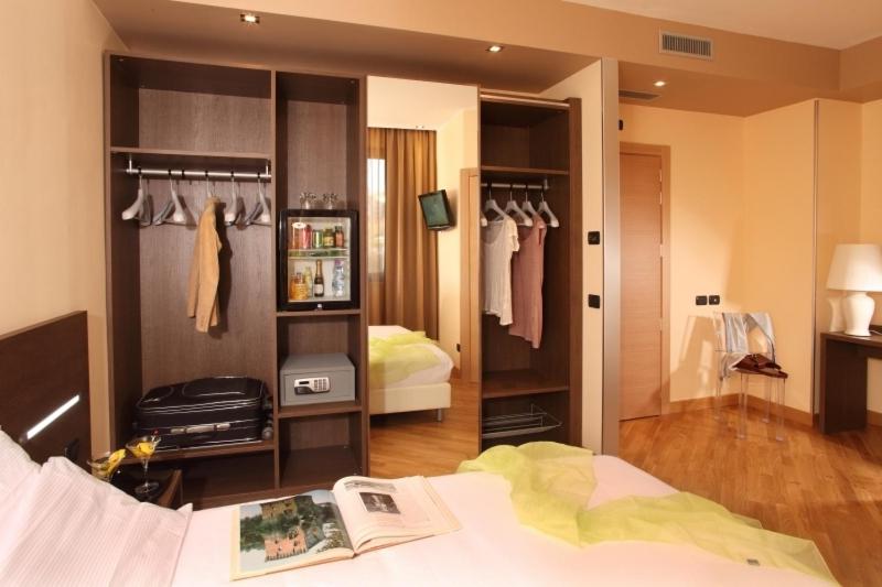 Postel nebo postele na pokoji v ubytování Hotel & Spa Villa Mercede