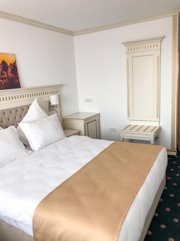 Postel nebo postele na pokoji v ubytování Hotel Terra
