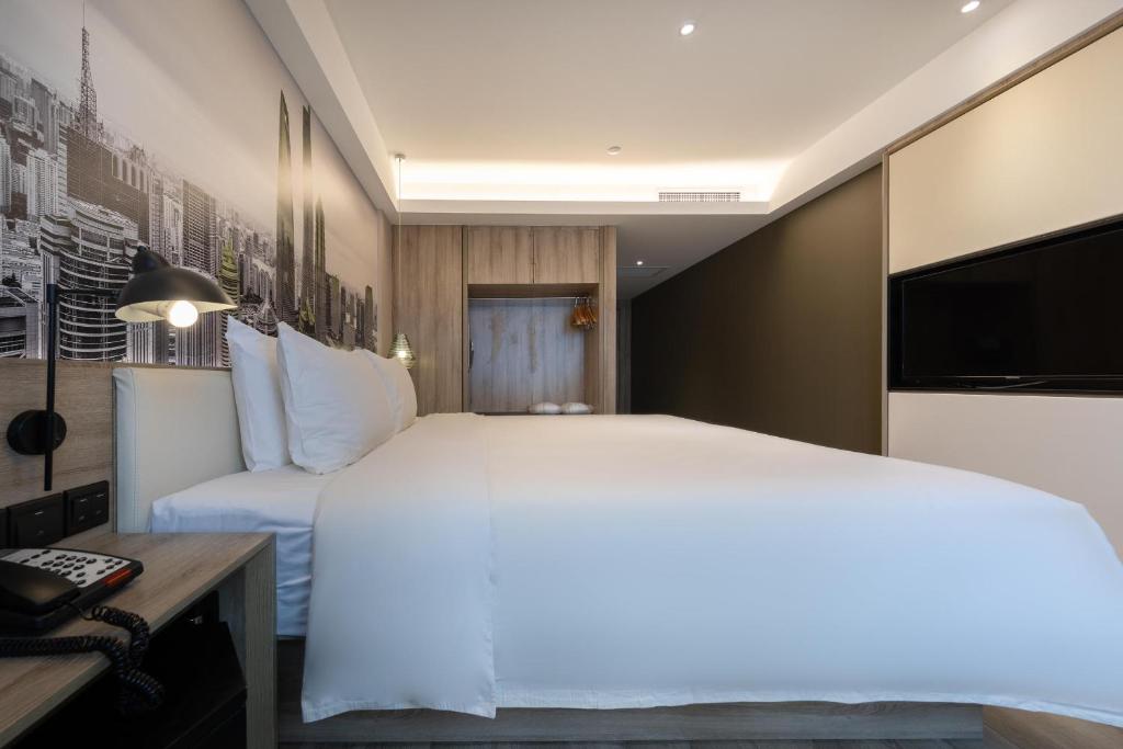 Postel nebo postele na pokoji v ubytování Atour Hotel Shanghai Lujiazui Babaiban
