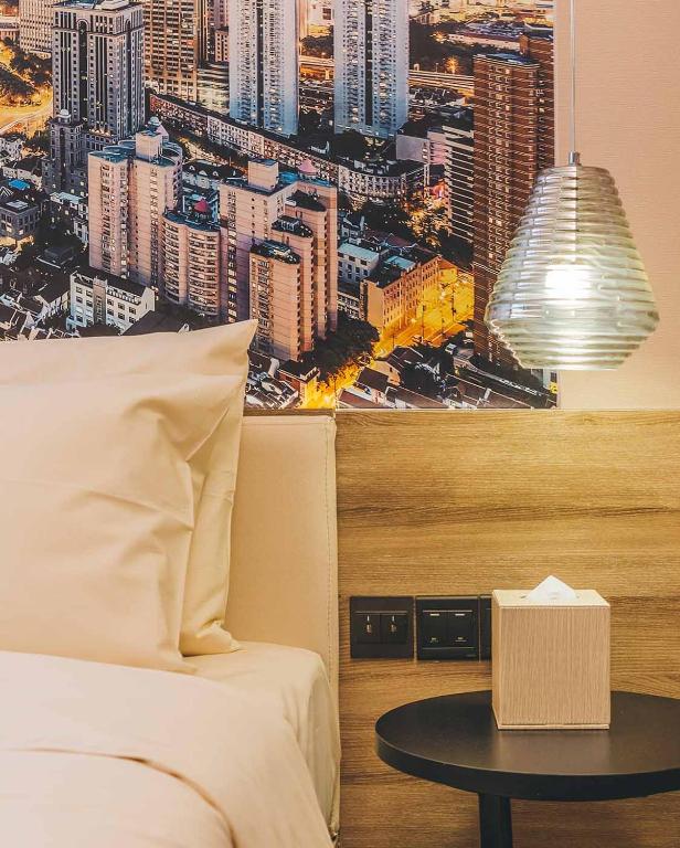 Postel nebo postele na pokoji v ubytování Atour Hotel Shanghai Lujiazui Babaiban