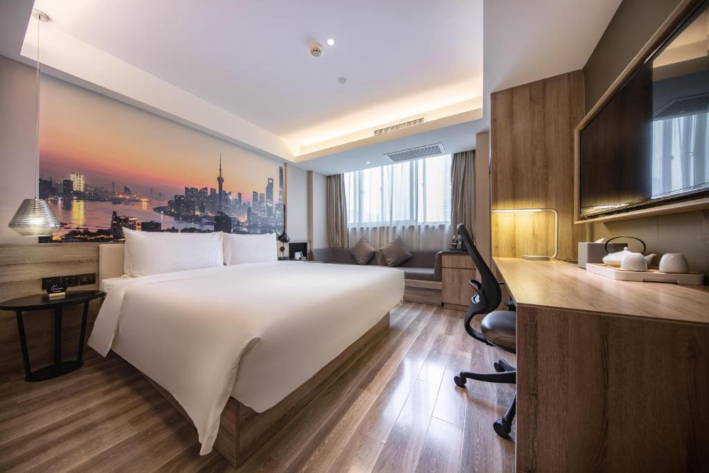 Postel nebo postele na pokoji v ubytování Atour Hotel Shanghai Lujiazui Babaiban