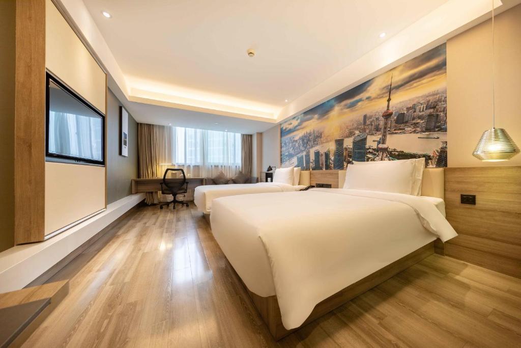 Postel nebo postele na pokoji v ubytování Atour Hotel Shanghai Lujiazui Babaiban