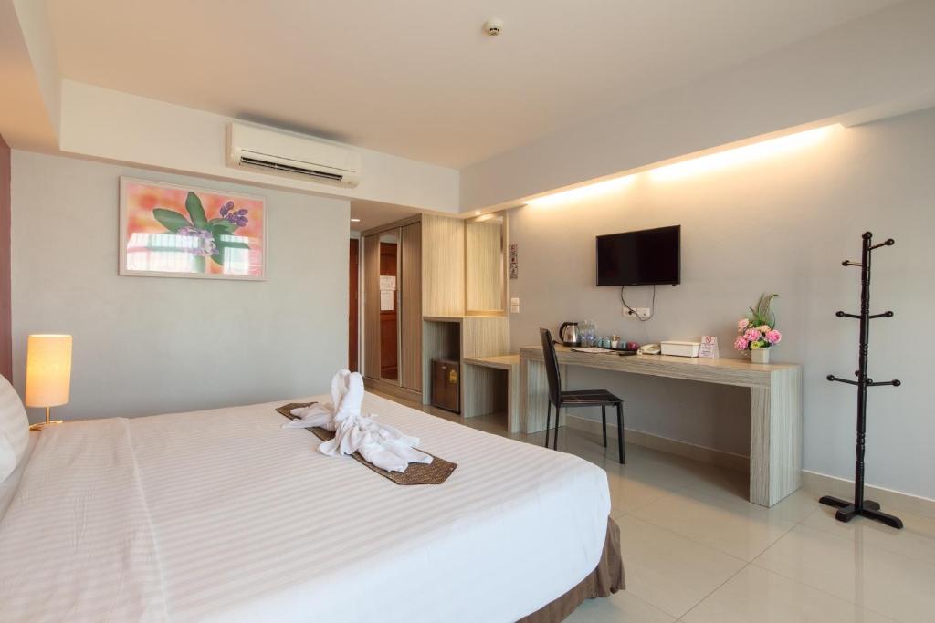 Postel nebo postele na pokoji v ubytování Tubtim Siam Suvarnabhumi Hotel