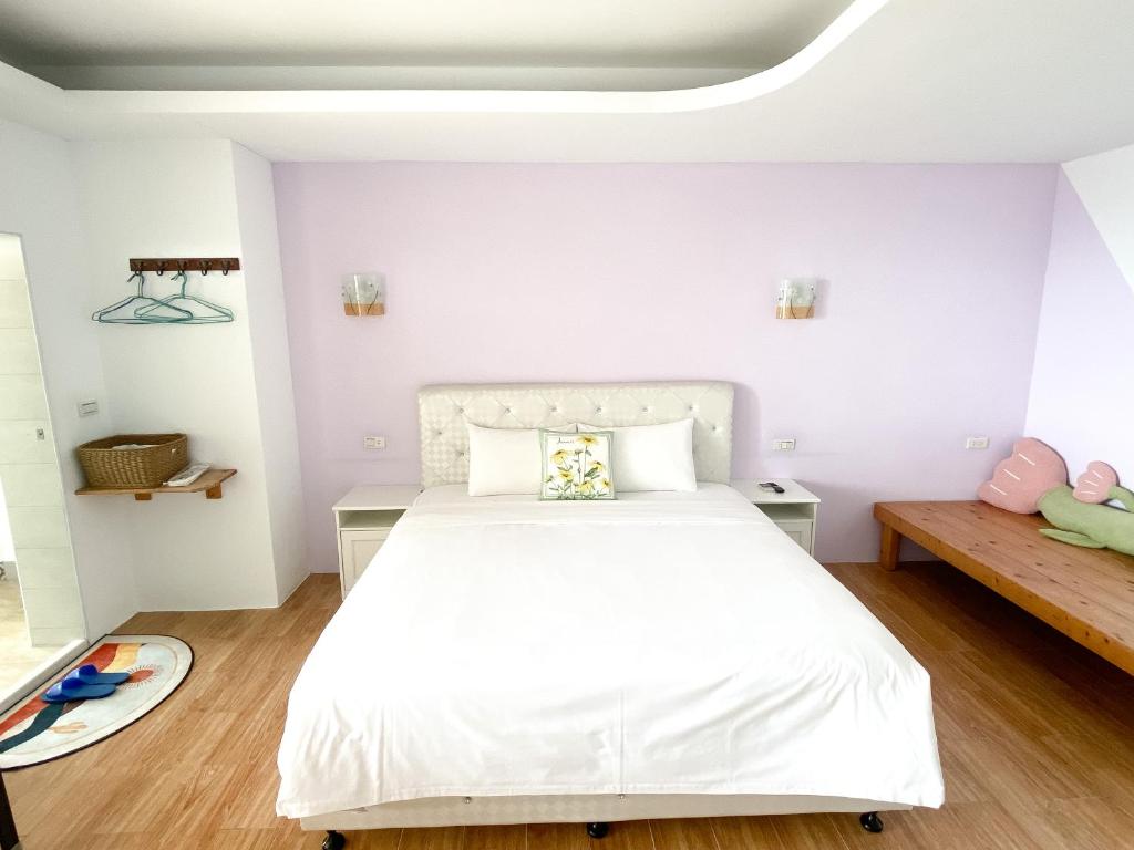 Postelja oz. postelje v sobi nastanitve 南鴻雅築South Home